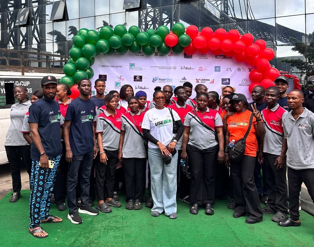 FixIt staff with partners and volunteers at a community sanitation event